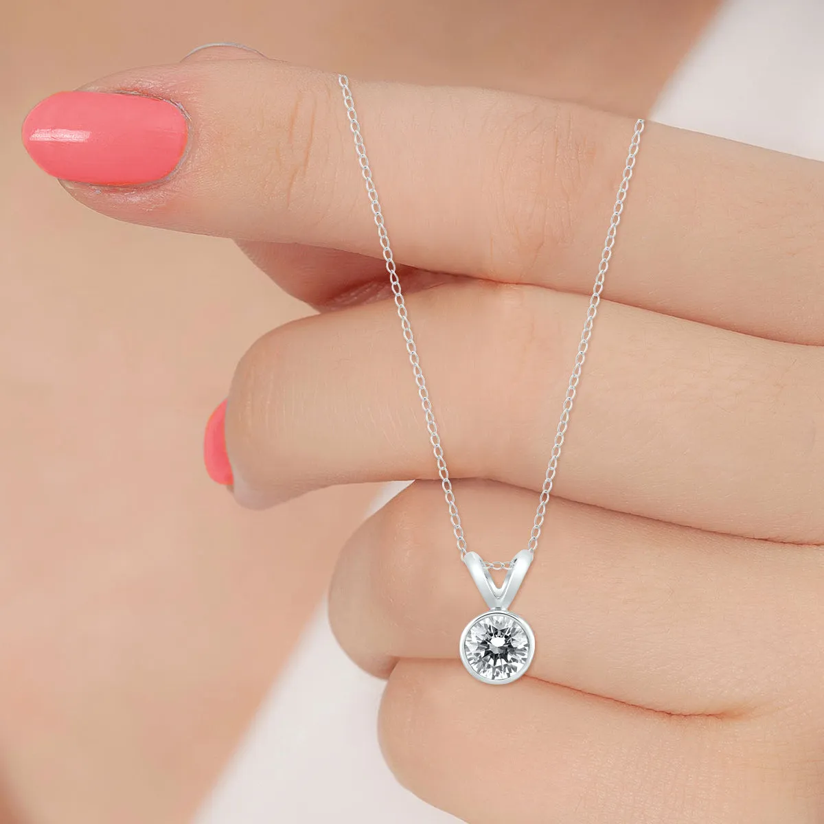 1/2 Carat Solitaire Diamond Bezel Pendant In 14K White Gold