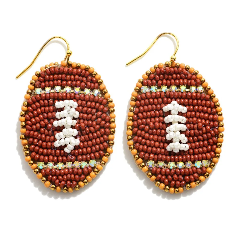 Bradshaw - A Pair of Sea Beaded. Football Drop Earrings