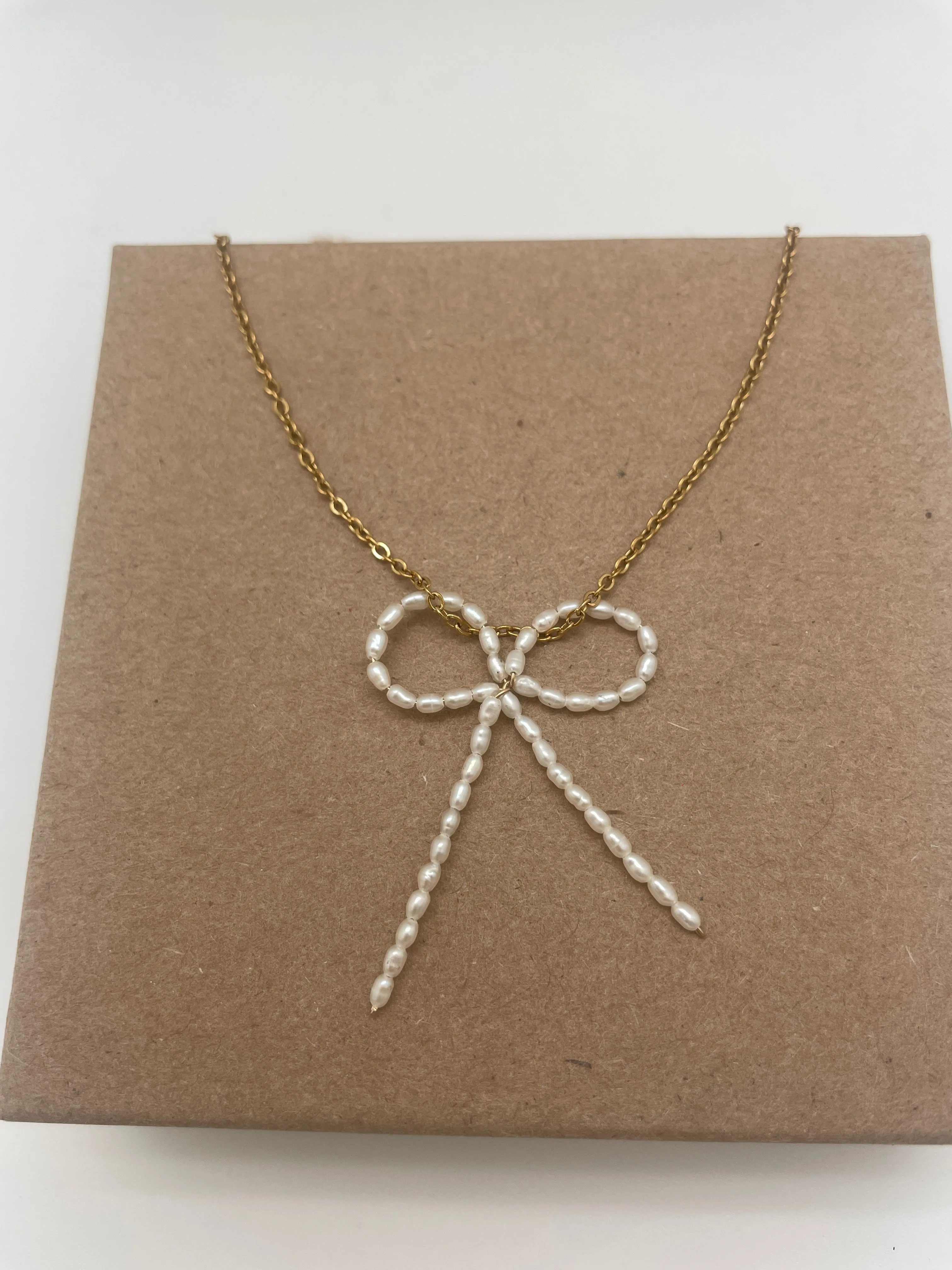 Freshwater pearl bow necklace