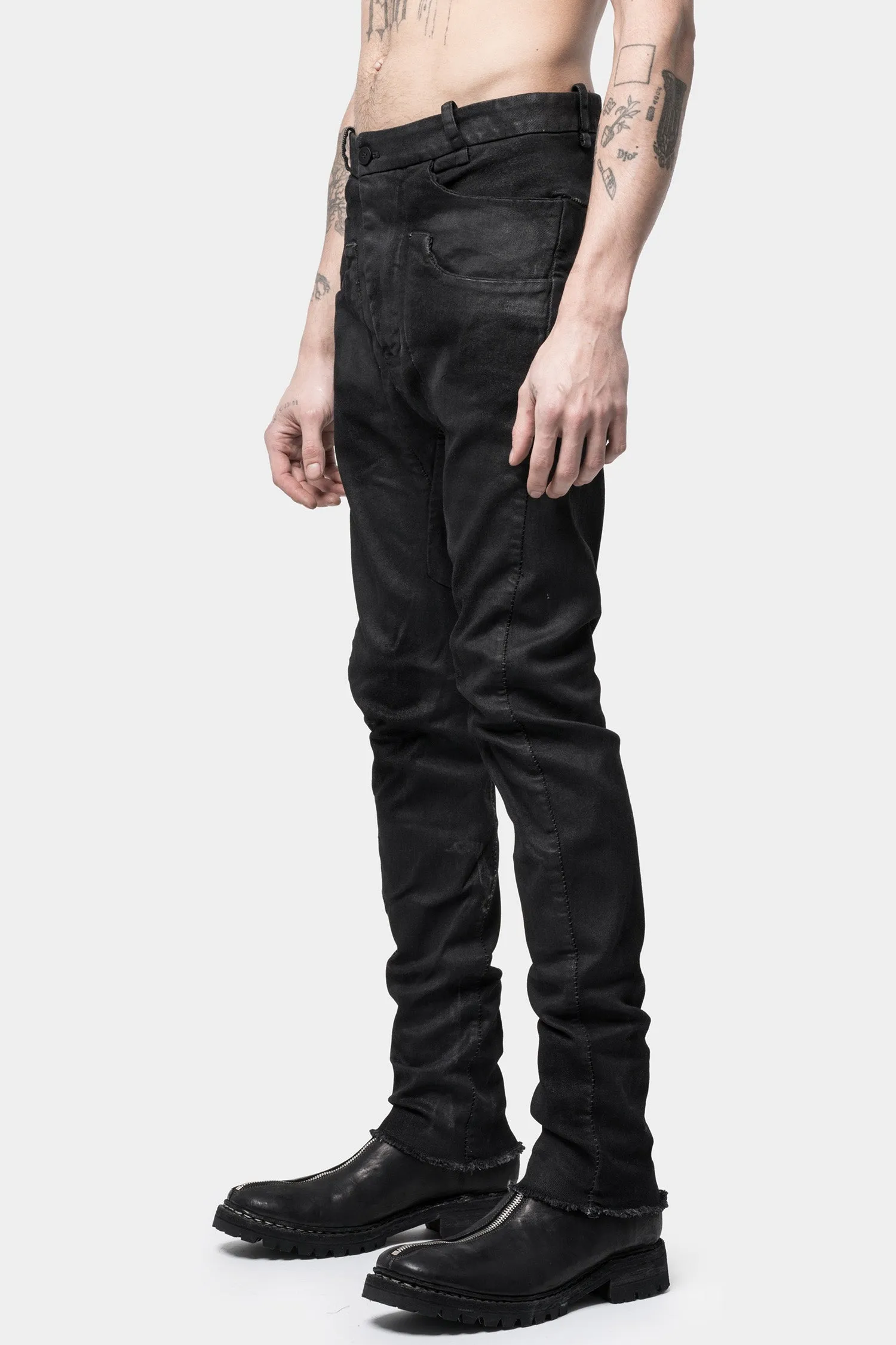 Layered pocket resinated jeans