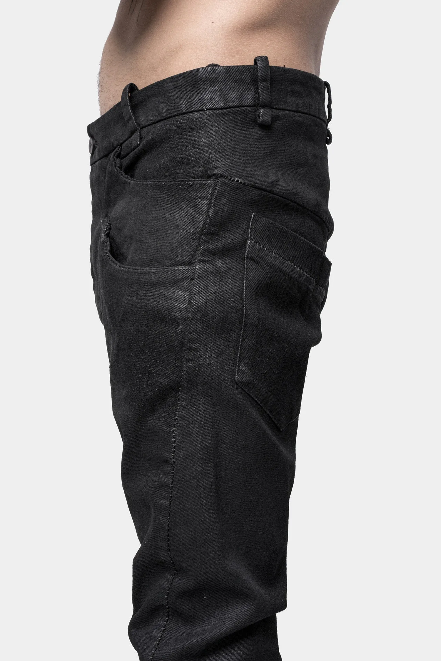 Layered pocket resinated jeans