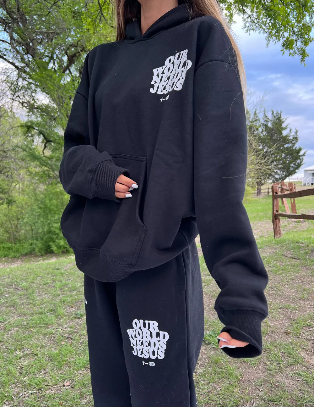 Our World Needs Jesus Black Unisex Sweatpant