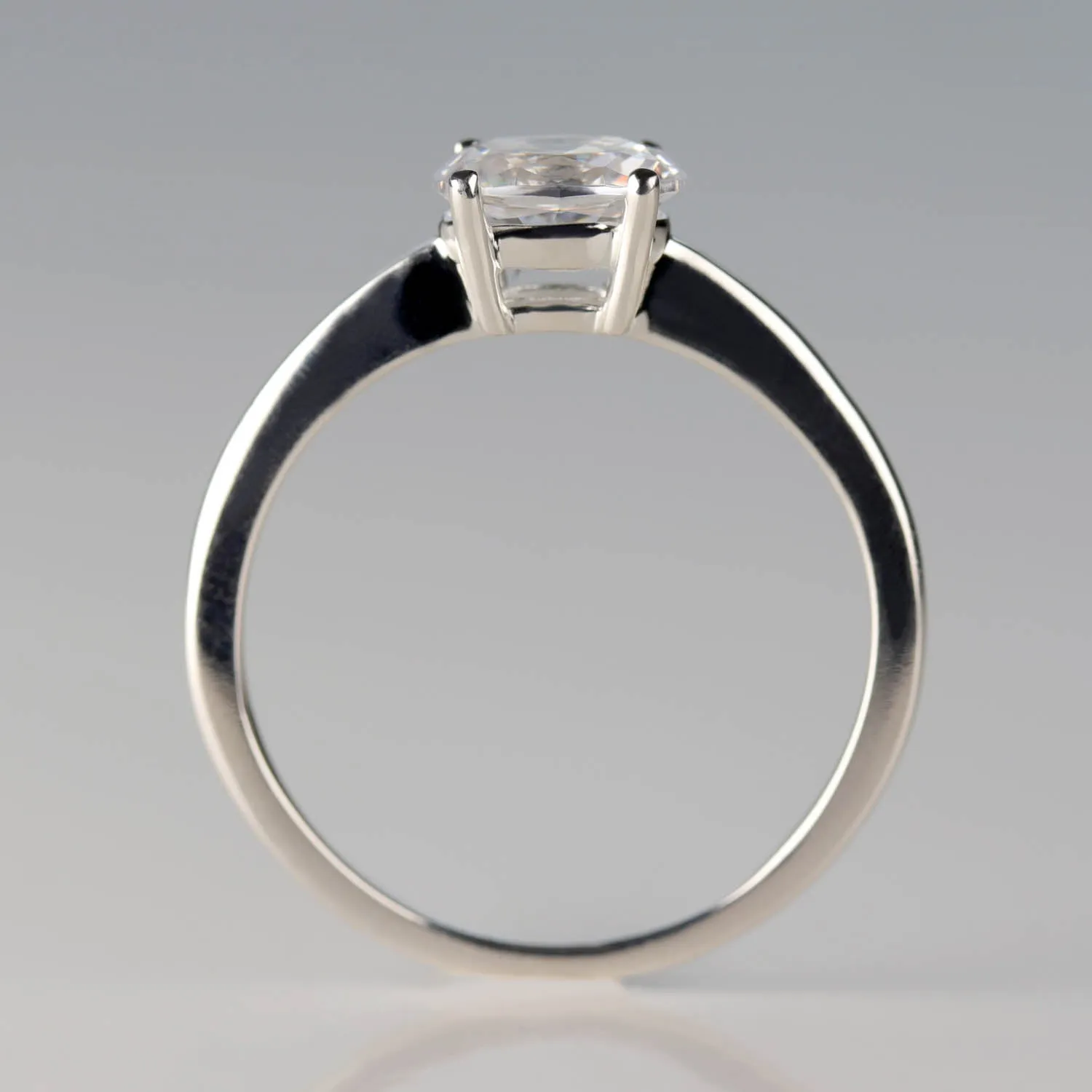 Oval Cut East-West Basket Solitaire Engagement Ring